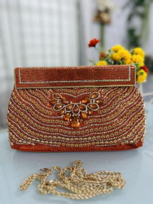 Picture of Exclusive High Quality Orange Color Party Bag 